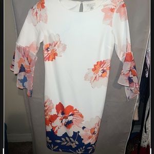 white, orange, and blue flowered church dress, worn once on Easter 2 year ago